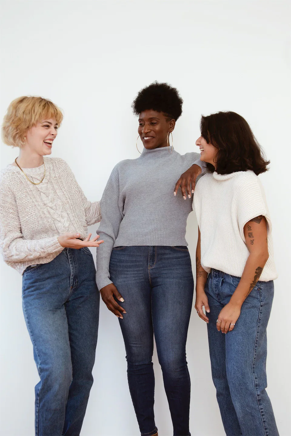 Three women posing for a picture
